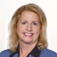 Professional Headshot of Ann Williamson, Former Chief Privacy Officer/Deputy General